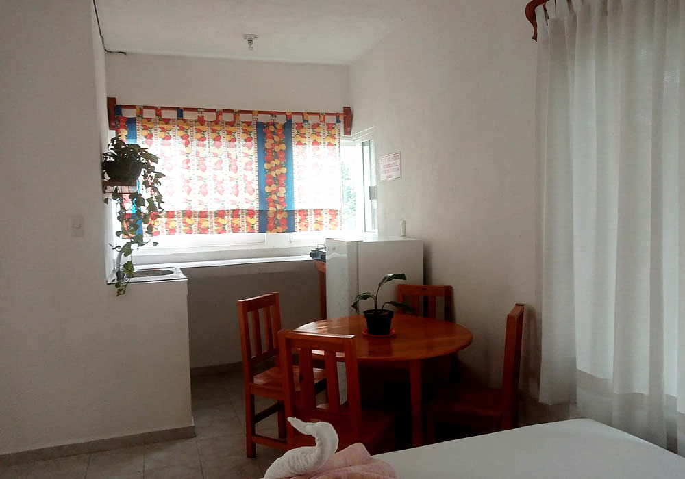 Habitación Triple con Cocineta