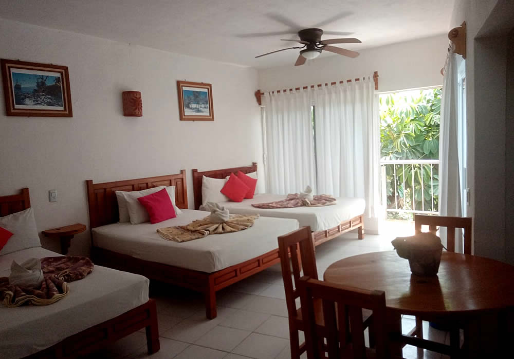 Habitación Triple con Cocineta