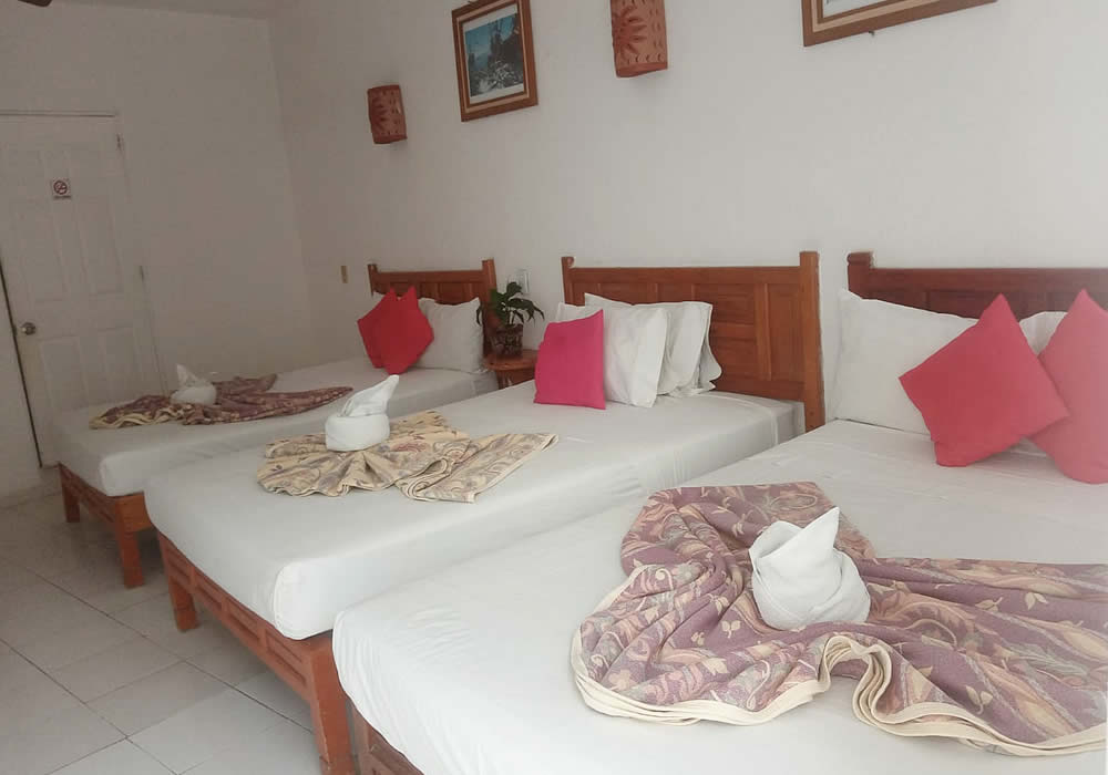 Habitación Triple con Cocineta